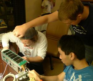 (clockwise from left) Engineering students John Furumo, Nicholas Fisher, and Kelson Lau.