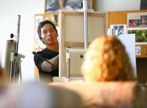 Sean Yoro paints from live model