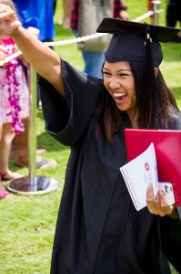Happy UH West O'ahu graduate at commencement