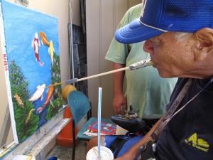 Morris Nakamura, REHAB Creative Arts Program, mouth painter.