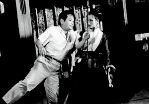 King Hu and Cheng Pei Pei on the set of "Come Drink With Me" in 1965.
